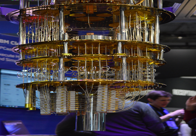 Quantum computer cooling system with multiple gold-plated layers and wiring, used to maintain ultra-low temperatures for quantum computing operation.